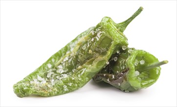 Portion of Pimientos de Padron as detailed close-up shot isolated on white background