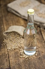 Portion of Wheat Liqueur as detailed close-up shot, selective focus