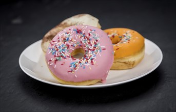 Fresh made Donuts as detailed close-up shots (selective focus)