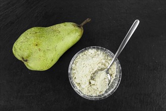 Portion of Pear powder as detailed close-up shot, selective focus