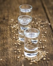 Portion of Wheat Liqueur as detailed close-up shot, selective focus