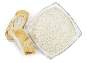 Breadcrumbs as detailed close-up shot isolated on white background (selective focus)