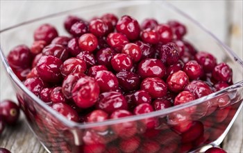 Portion of Preserved Cranberries as detailed close-up shot, selective focus