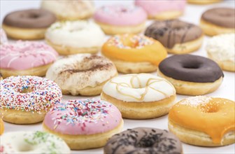 Fresh made Donuts as detailed close-up shots (selective focus)