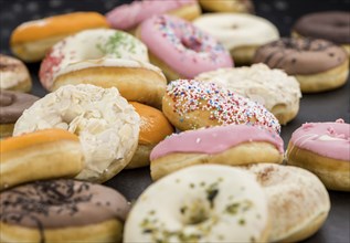 Fresh made Donuts as detailed close-up shots (selective focus)