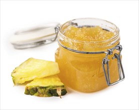 Pineapple Jam isolated on white background, selective focus, close-up shot