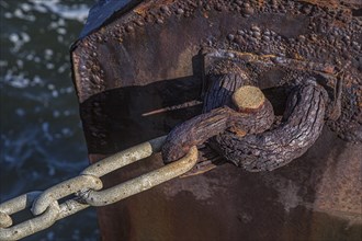 Rusted anchor pin along the Pensacola Bay seawall at the Vince Whibbs Sr. Community Maritime Park