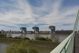 View over the Rhine with crane houses, Cologne, Germany, Europe