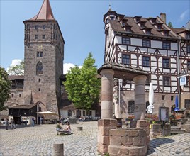 Medieval draw well, on the right the PÃœilatushaus, on the left the Tiergärtnertorturm 14th