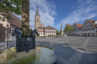 Gaulsbrunnen, built in 1823, behind the old town hall, and the town church, Königsplatz, Schwabach,