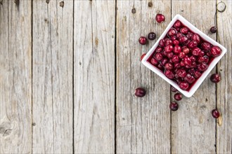 Portion of healthy Cranberries (preserved) (selective focus, close-up shot)