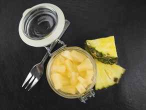 Portion of fresh Preserved Pineapple pieces close-up shot, selective focus