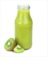 Portion of fresh made Kiwi Smoothie isolated on white background (close-up shot, selective focus)