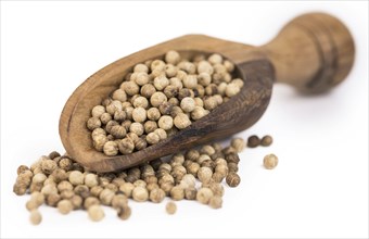 Portion of White Pepper as detailed close-up shot isolated on white background