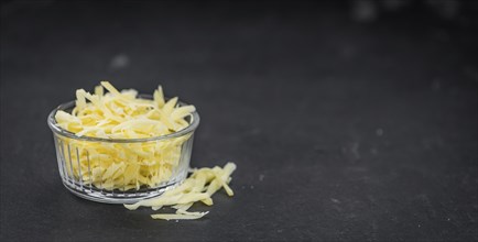 Fresh made Grated Cheese as detailed close-up shot