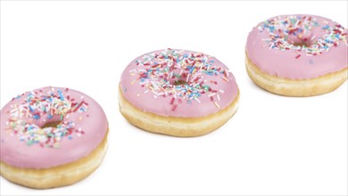 Fresh made Donuts isolated on white background (selective focus)