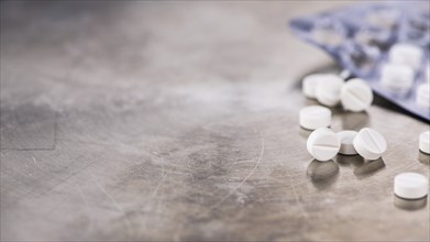 Small pills as detailed close-up shot (selective focus)