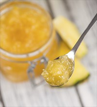 Fresh made Pineapple Jam on a vintage background as detailed close-up shot