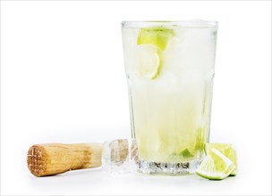 Caipirinha isolated on white background (selective focus, close-up shot)