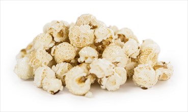 Portion of Popcorn as detailed close-up shot isolated on white background