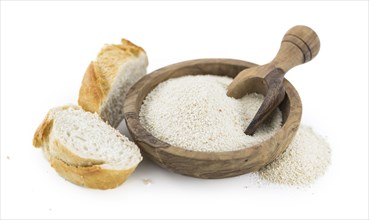 Bread Crumbs isolated on white background (selective focus, close-up shot)