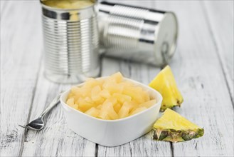 Portion of fresh Preserved Pineapple pieces close-up shot, selective focus