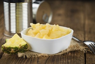 Portion of fresh Preserved Pineapple pieces close-up shot, selective focus