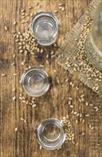 Portion of Wheat Liqueur as detailed close-up shot, selective focus