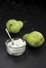 Fresh made Pear powder on a slate slab (close-up shot, selective focus)