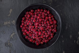 Portion of healthy Cranberries (preserved) (selective focus, close-up shot)