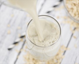 Portion of Oat Milk as detailed close-up shot, selective focus