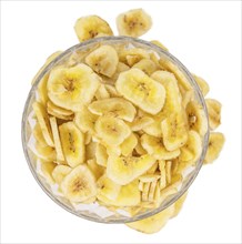 Dried Banana Chips isolated on white background, selective focus, close-up shot