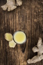 Portion of fresh Ginger Juice (selective focus, close-up shot)