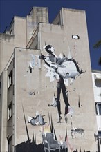 Mural with surreal figures by Greek street artist Vasmou, Psirri neighbourhood, Athens, Greece,