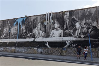 Last Supper in Athens, mural in black and white by Greek street artist INO, Gazi neighbourhood,