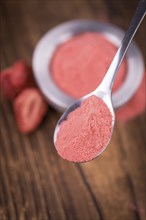 Instant Strawberries on a vintage background as detailed close-up shot, selective focus