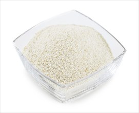 Bread Crumbs isolated on white background (selective focus, close-up shot)