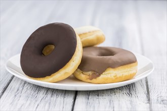 Fresh made Donuts as detailed close-up shots (selective focus)