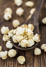 Some homemade Popcorn as detailed close-up shot, selective focus