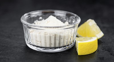 Portion of healthy Lemon powder (selective focus, close-up shot)