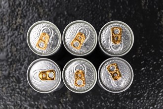 Energy Drinks on a vintage slate slab as detailed close-up shot, selective focus