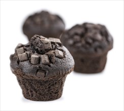 Chocolate Muffins isolated on white background (selective focus, close-up shot)