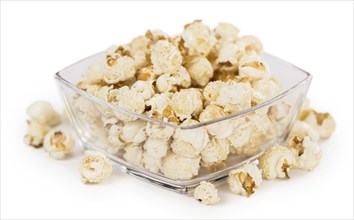 Portion of Popcorn as detailed close-up shot isolated on white background