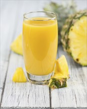 Some homemade Pineapple Juice as detailed close-up shot, selective focus