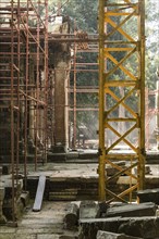 Archaeological site and renovation in Ta Prohm Temple, Angkor Wat Cambodia with spectacular light