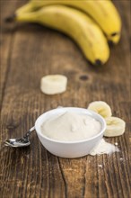 Fresh made Ground Banana on an old and rustic wooden table, selective focus, close-up shot