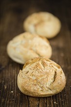 Fresh made German Buns on a vintage background as detailed close-up shot