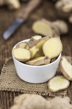 Some fresh Ginger Slices (selective focus, close-up shot)