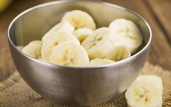 Portion of fresh Sliced Bananas close-up shot, selective focus