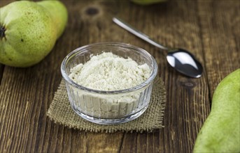 Portion of Pear powder as detailed close-up shot, selective focus